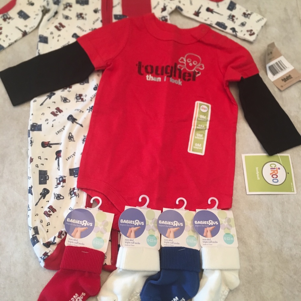 2 Onesie’s (size 9 mnths)  & 4 pairs of socks